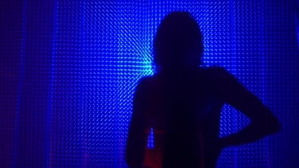 Beauty Model girl dancing shadow silhouette. Beautiful sexy young woman perfect slim body dance in uv light. Silhouette of a girl dancing in the shower behind the curtain — Stockvideo