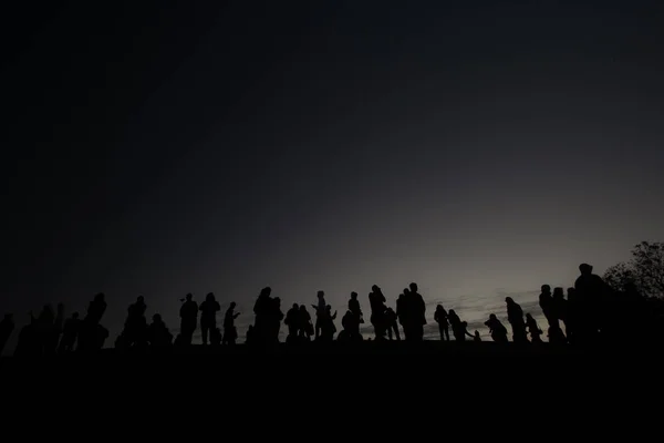 Stock image silhouette of people at sunset