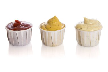 Set of three sauces, red tomato, mustard and bearnaise in recyclable paper cups, isolated on white background. clipart