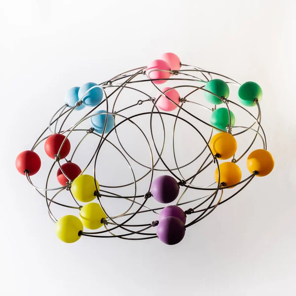 Multicolored handmade three-dimensional model of geometric solid on a white background. — Stock Photo, Image