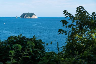 Munseom ay Adası ile Seogwipo, Jeju Adası, Kore, okyanusta gemi iz