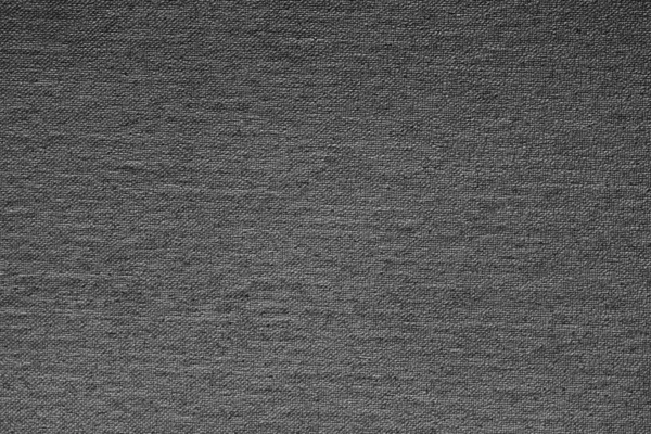 Gray black white linen canvas. The background image, texture.