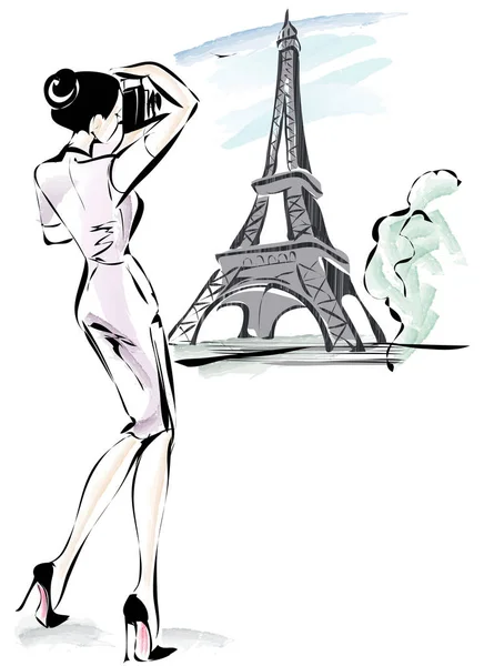 Hermosa joven toma una foto cerca de la torre Eiffel en París, Francia, ilustración vector acuarela — Vector de stock