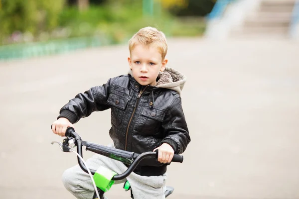 Portrait of adorable little urban boy wearing black leather jack — Stock Photo, Image