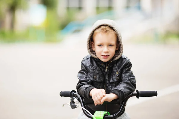 Portrait of adorable little urban boy wearing black leather jack — Stock Photo, Image