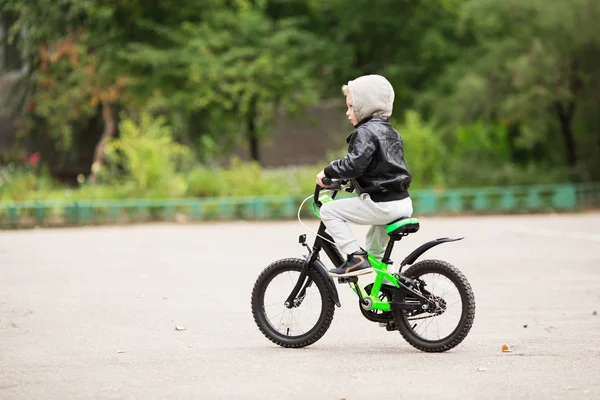 Portrait of adorable little urban boy wearing black leather jack — Stock Photo, Image