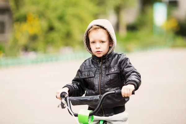 Portrait of adorable little urban boy wearing black leather jack — Stock Photo, Image