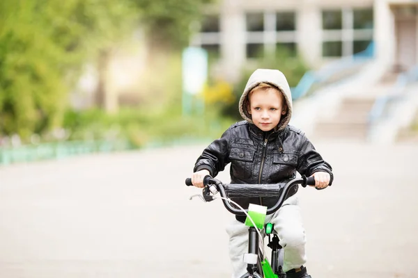 Portrait of adorable little urban boy wearing black leather jack — Stock Photo, Image