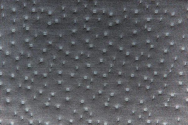 Textura punteada de tela gris. De cerca. — Foto de Stock