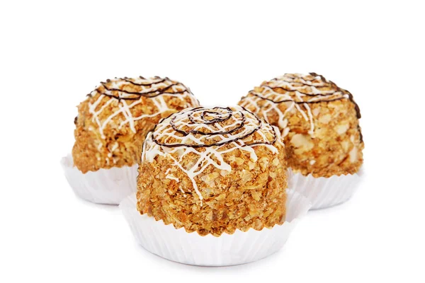 Três muffin isolado em um branco — Fotografia de Stock