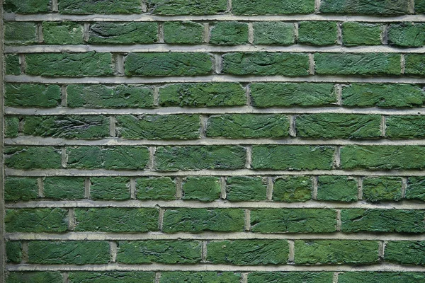 Green grunge brick wall background — Stock Photo, Image