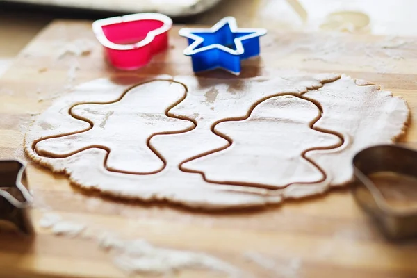 Homemade gingerbread cookies, forms and baking ingredients. — Stock Photo, Image