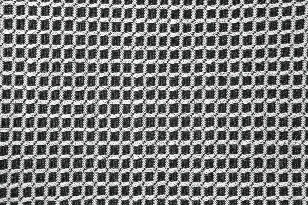 Black and white textured checkered fabric