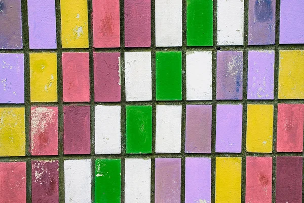 Textuur van oude wandtegels met lichte verf peeling. kleurrijke ol — Stockfoto