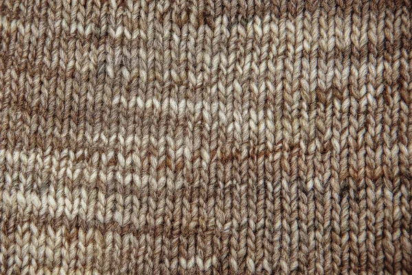 Wool scarf texture close up. Knitted jersey background with a re Royalty Free Stock Photos