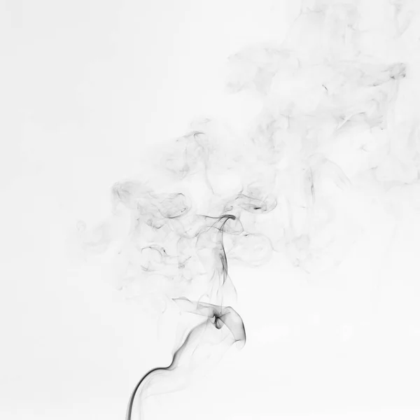 白色背景上的美丽黑色烟雾 — 图库照片
