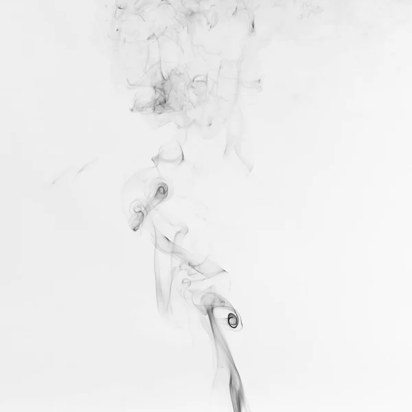Fumée noire sur fond blanc — Photo
