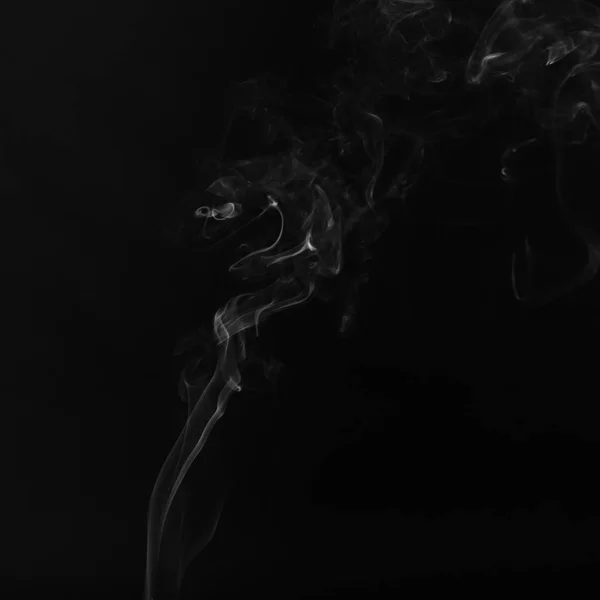 Humo blanco sobre fondo negro — Foto de Stock