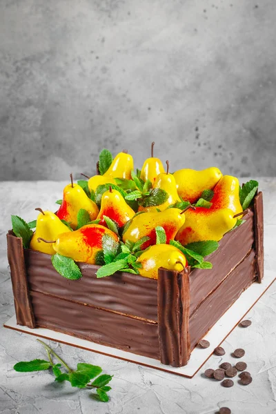 Birthday cake in the form of a chocolate box filled with pears m