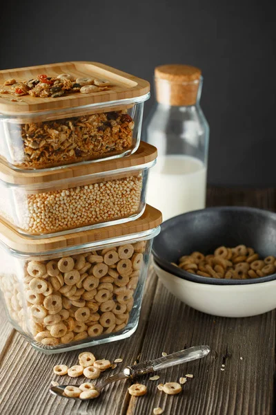 Breakfast cereal. Glass boxes with granola, cereal rings and Qui