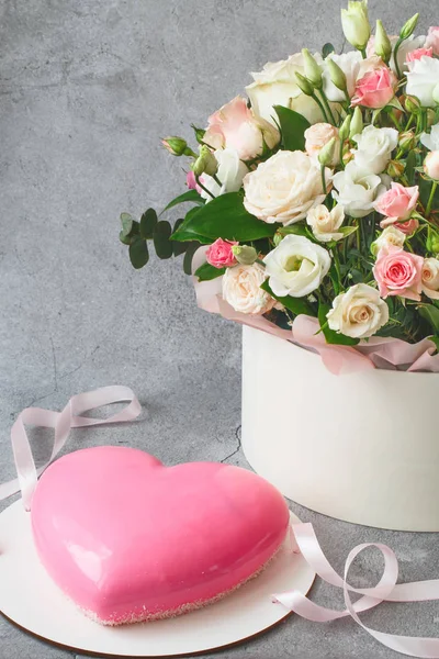 Gift set - pink heart-shaped mousse cake and a large bouquet of