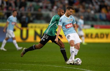 Varşova, Polonya, 08 Mart 2020: Legia Warszawa ile Piast Gliwice, Jose Kante (Legia Warszawa) Uros Korun (Piast Gliwice) arasındaki Polonya Süper Ligi Ekstraklasa futbol maçı) 