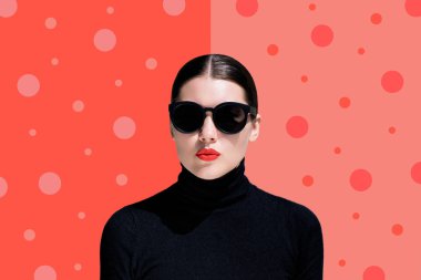 Moda portre siyah güneş gözlüğü ile genç bir kadın 