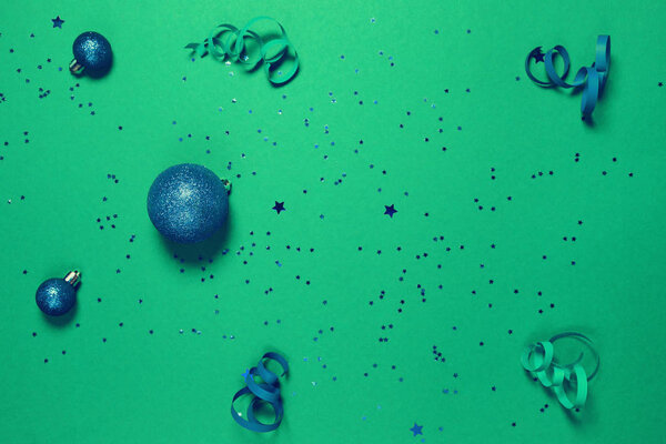 Decorative balls, cofetti, shiny stars on paper background. Chri