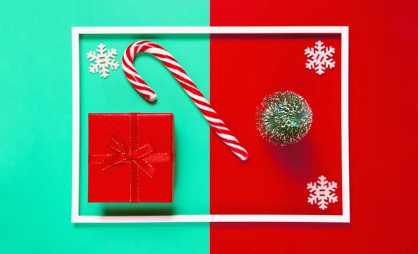 Chrismas composition with present box, decorative fir tree, loll