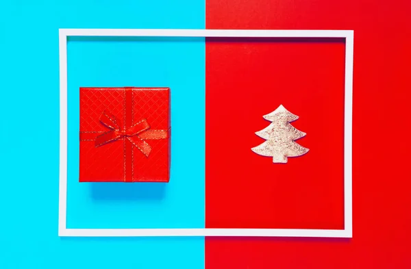 Christmas composition with present box and decorative fir tree o