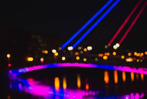 Abstrakcyjne nieostre tło kolorowych świateł miejskich w nocy. Zdjęcie Stockowe