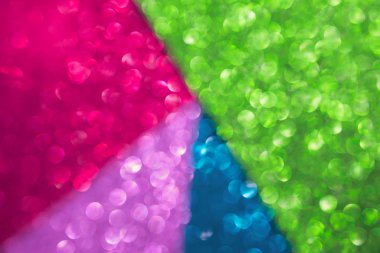 Renkli soyut bokeh arkaplanı. Odaklanmamış ışıklar.