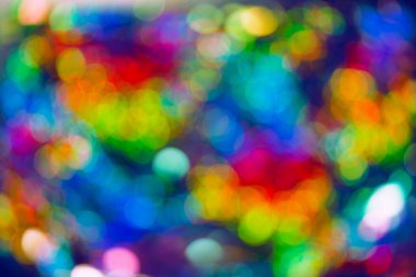 Soyut bokeh arkaplanı. Odaklanamayan renkli ışıklar. Parti, tatil ve festival konsepti