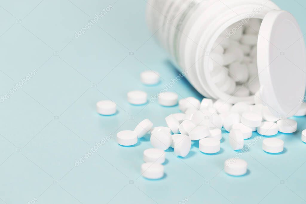 Pills in a bottle close up. Health care theme concept. Abstract background for blogs and web design. Selective focus. Copy space
