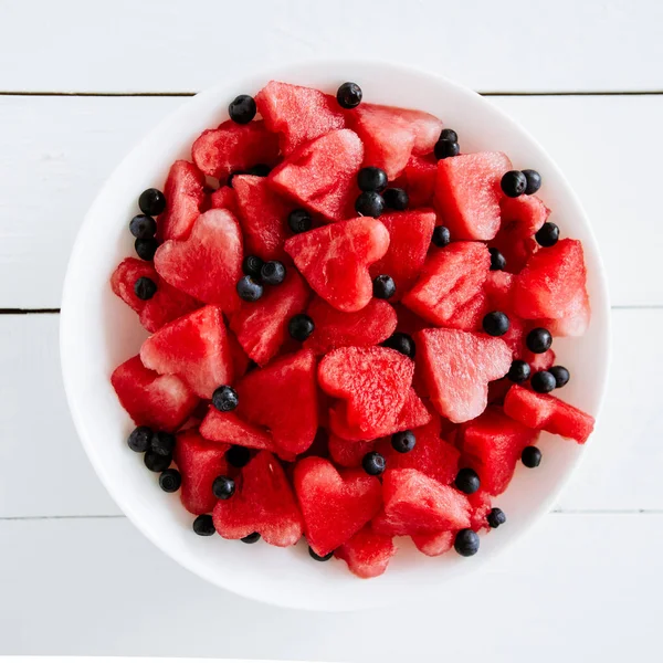 Stukjes watermeloen en harten — Stockfoto