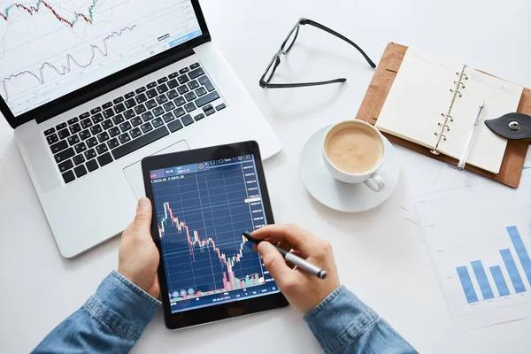 stock image Investor watching the change of stock market on tablet.