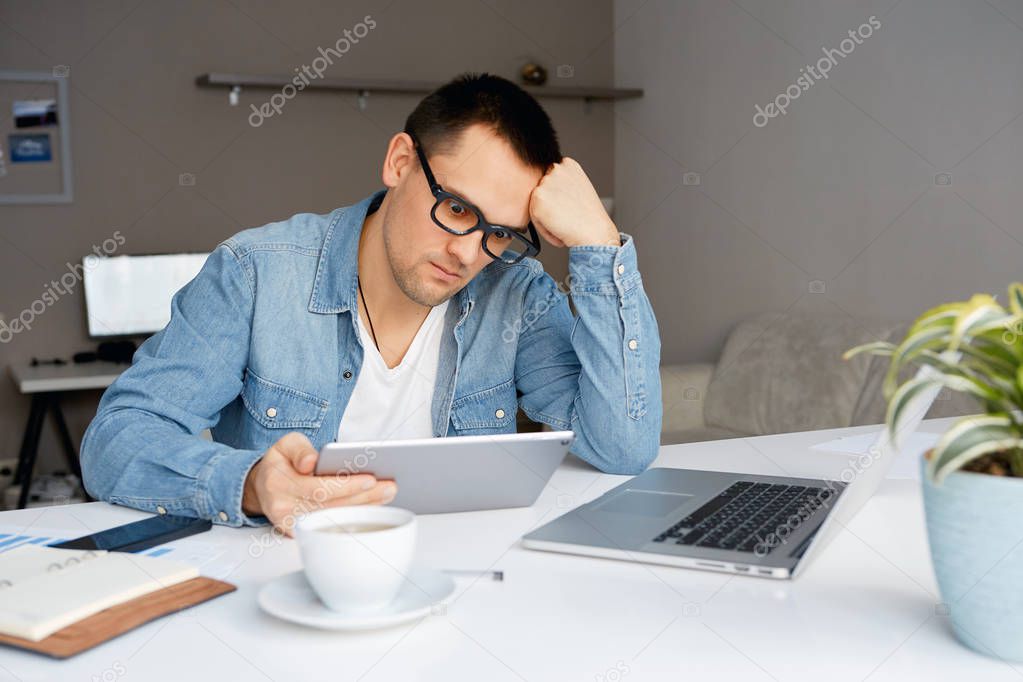 Man working from home on his laptop.