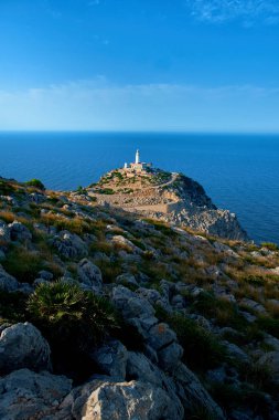 Lighthouse at Cap de Formentor on Majorca while sunset. clipart