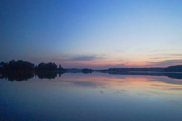 Zachód słońca w rzece z reflex — Zdjęcie stockowe