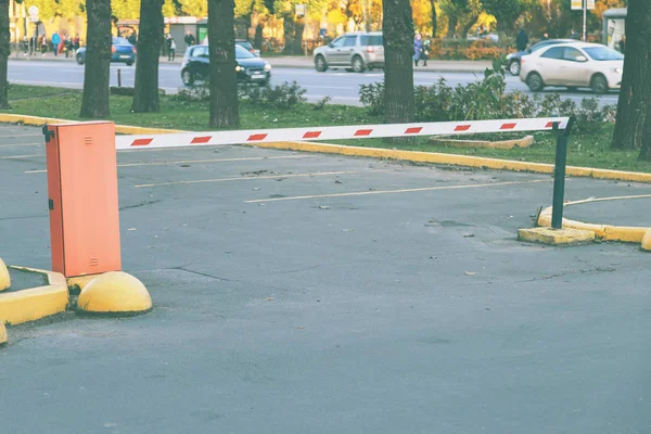 Barrier in the parking lot — Stock Photo, Image