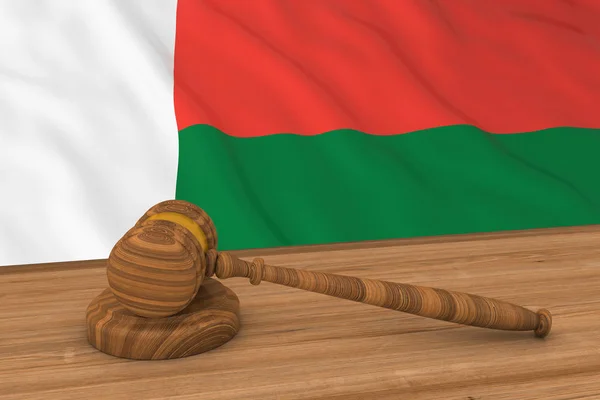 Concept de droit malgache - Drapeau de Madagascar derrière le marteau du juge Illustration 3D — Photo