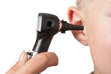 Examination with the otoscope clipart