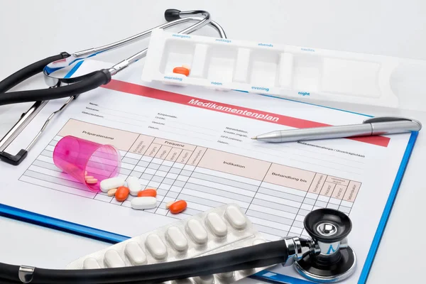 Medication plan with tablets and stethoscope — Stock Photo, Image