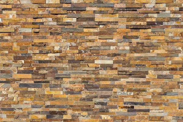 Detalhe de uma parede de pedra natural, como fundo — Fotografia de Stock