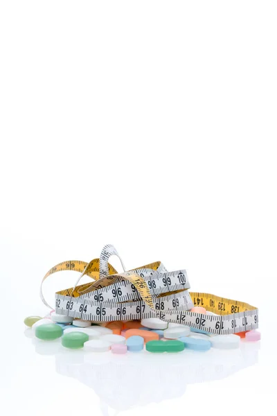 Tape measure and Pills — Stock Photo, Image