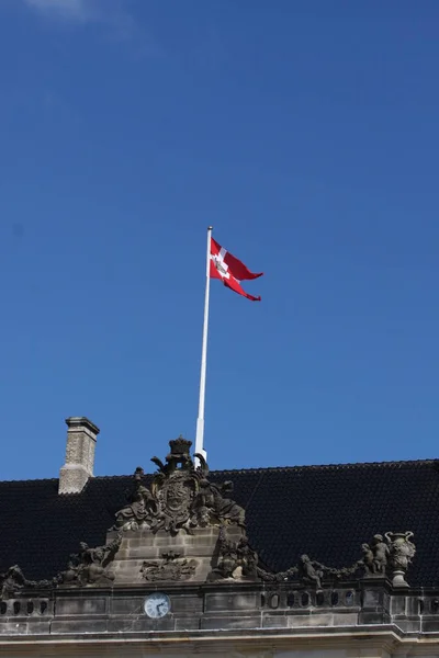 Flag of Denmark with Blue Sky Background — Stock Photo, Image