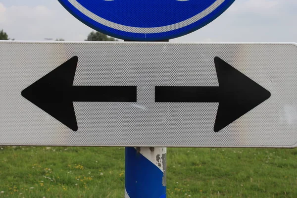 Left Right sign on road
