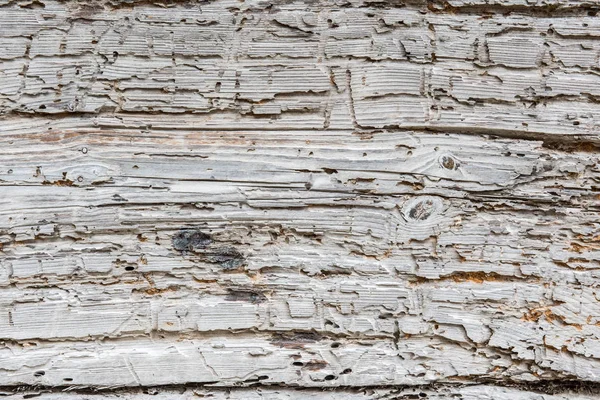 Textura de tábuas verticais de madeira velha com arranhões e rachaduras . — Fotografia de Stock