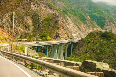 Beautiful View of the California Coastline along State Road 1. clipart