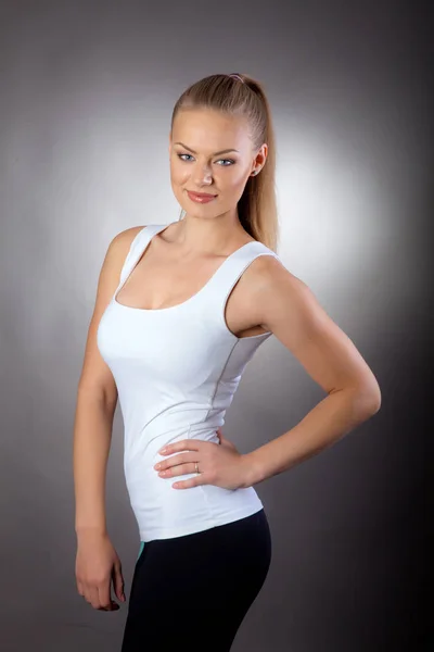 Young Athletic European Girl Posing Gray Background — Stock Photo, Image